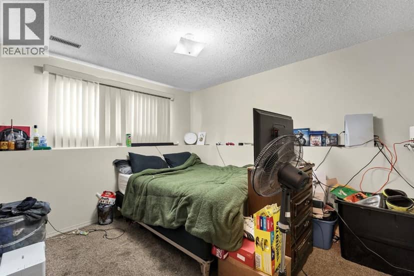 908 Ross Glen Drive SE — photo 18 of 40