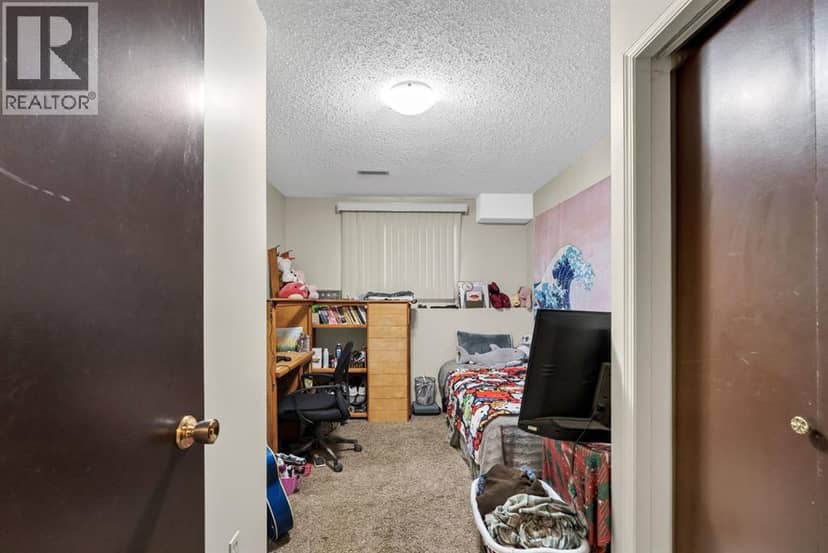 908 Ross Glen Drive SE — photo 20 of 40