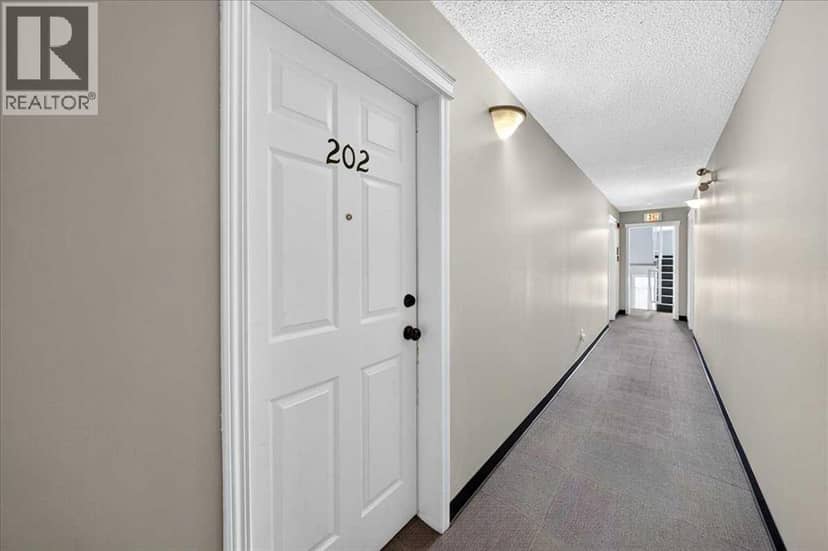 202, 6148 Bowness Road NW — photo 11 of 40