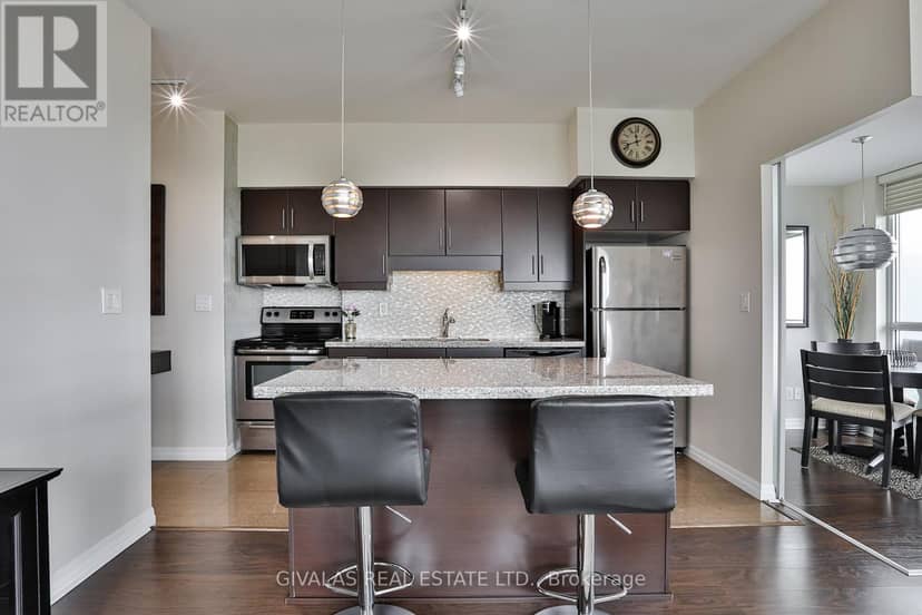 2110 - 30 Herons Hill Way — photo 12 of 40