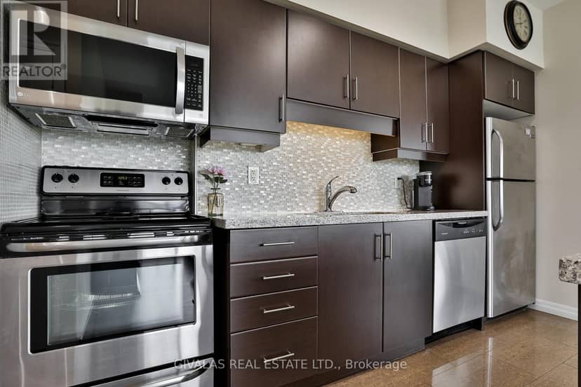 2110 - 30 Herons Hill Way — photo 13 of 40