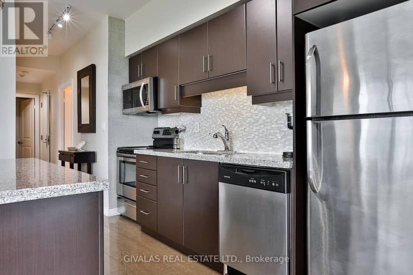 2110 - 30 Herons Hill Way — photo 14 of 40
