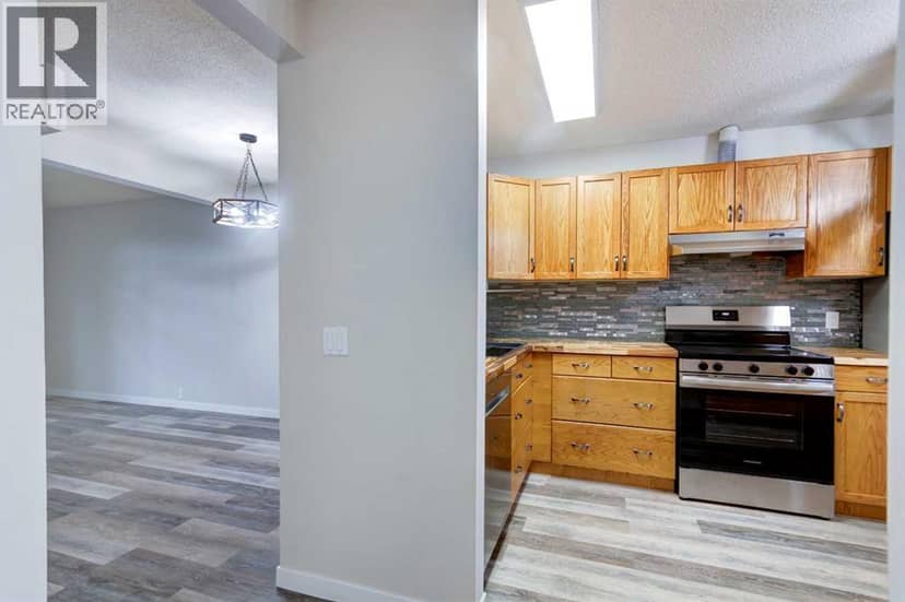 12, 310 Brookmere Road SW, Calgary, photo 7