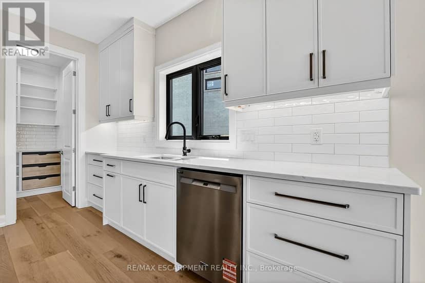 6192 Curlin Crescent — photo 14 of 40