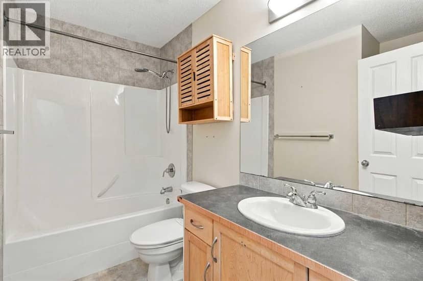 209 Tuscany Ravine Road NW — photo 19 of 38
