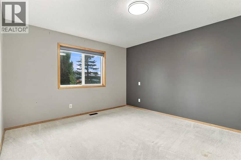 209 Tuscany Ravine Road NW — photo 22 of 38