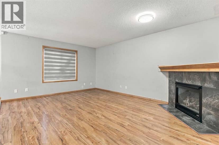 209 Tuscany Ravine Road NW — photo 9 of 38