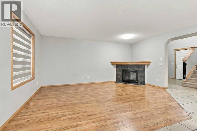 209 Tuscany Ravine Road NW — photo 10 of 38