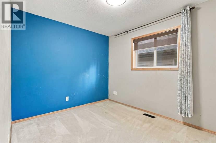 209 Tuscany Ravine Road NW — photo 17 of 38