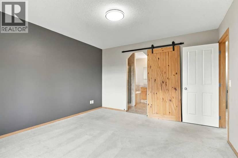 209 Tuscany Ravine Road NW — photo 24 of 38