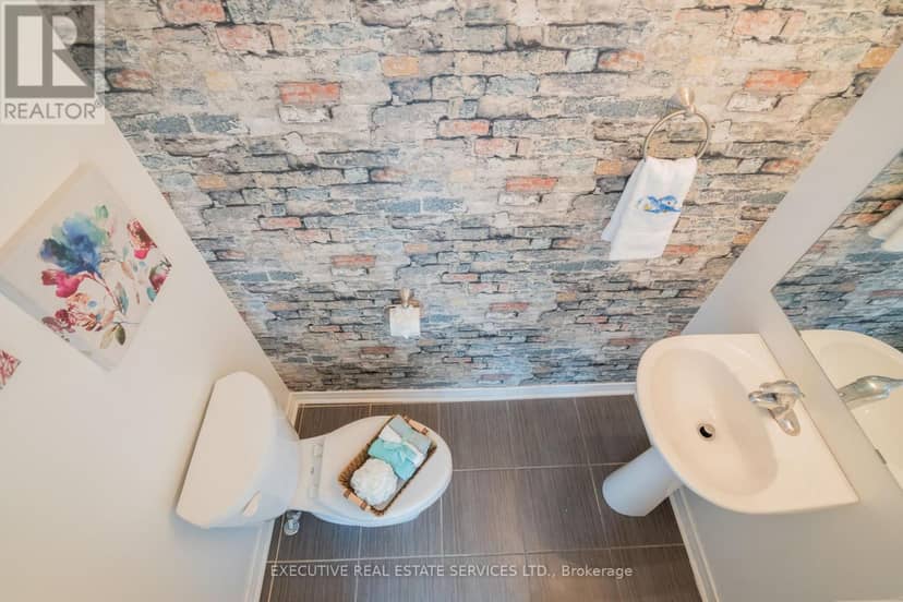10 - 180 Howden Boulevard — photo 12 of 40
