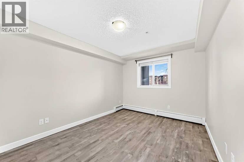4118, 403 Mackenzie Way SW — photo 30 of 40