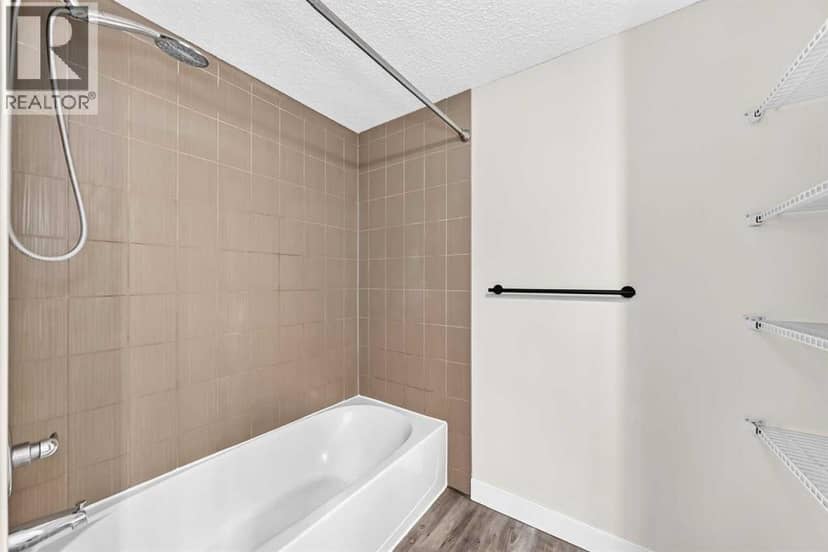 4118, 403 Mackenzie Way SW — photo 33 of 40