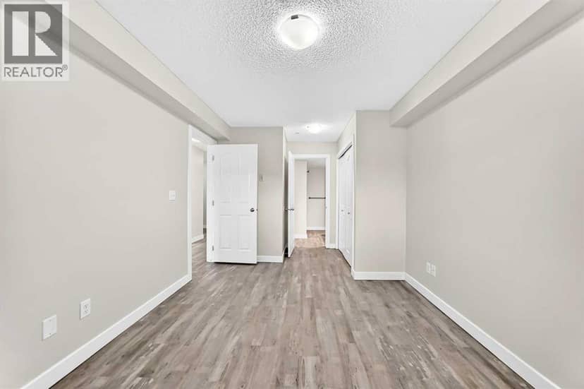 4118, 403 Mackenzie Way SW — photo 28 of 40