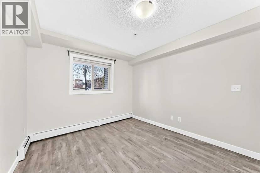 4118, 403 Mackenzie Way SW — photo 26 of 40