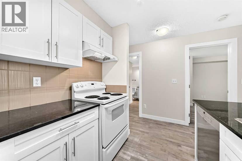 4118, 403 Mackenzie Way SW — photo 9 of 40