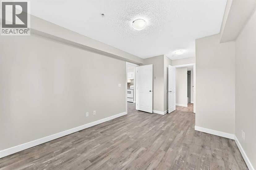 4118, 403 Mackenzie Way SW — photo 27 of 40