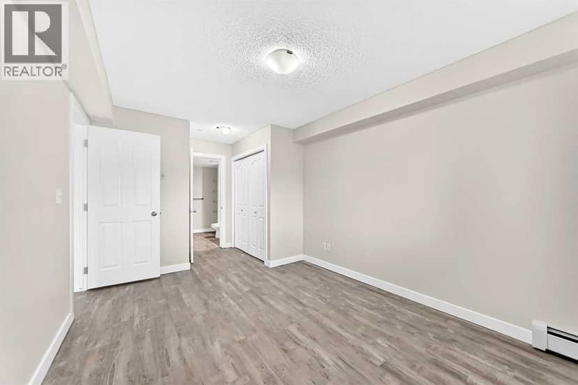 4118, 403 Mackenzie Way SW — photo 29 of 40