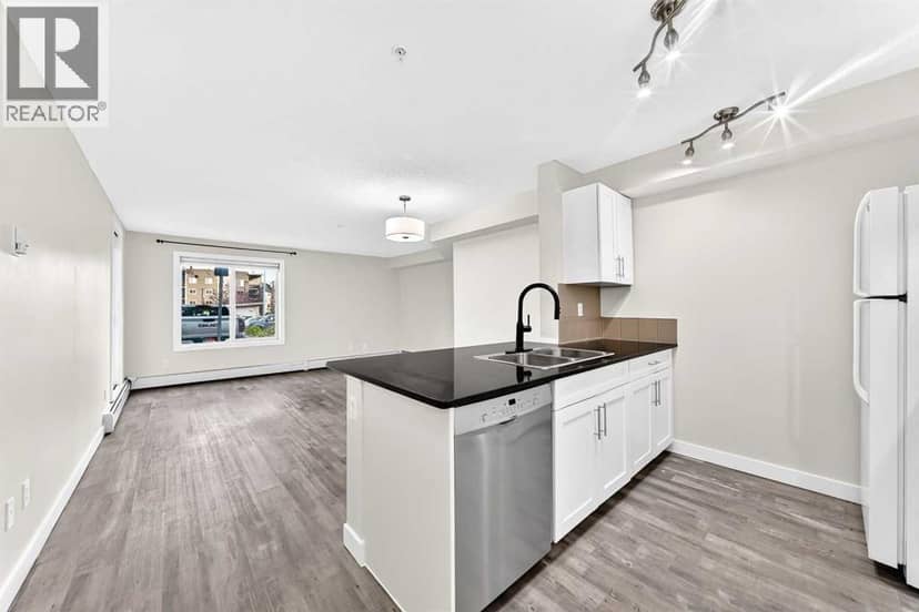 4118, 403 Mackenzie Way SW, Airdrie, photo 3