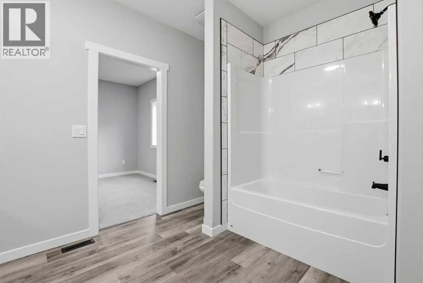 5242 51 Street — photo 12 of 39