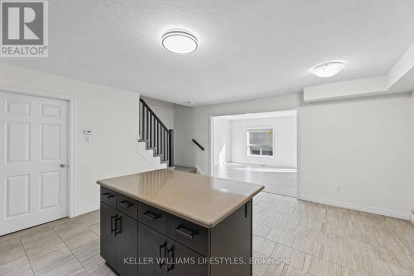 63 - 1220 Riverbend Road — photo 11 of 38