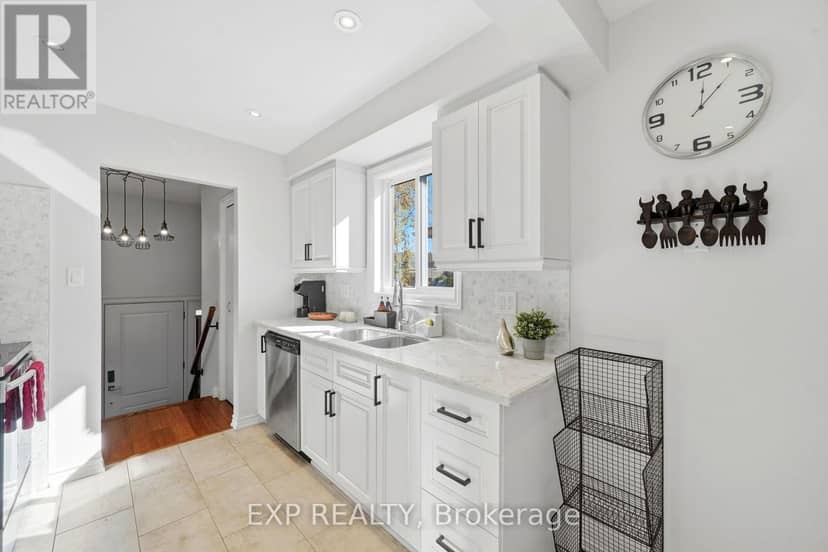 6348 Atherly Crescent — photo 9 of 40