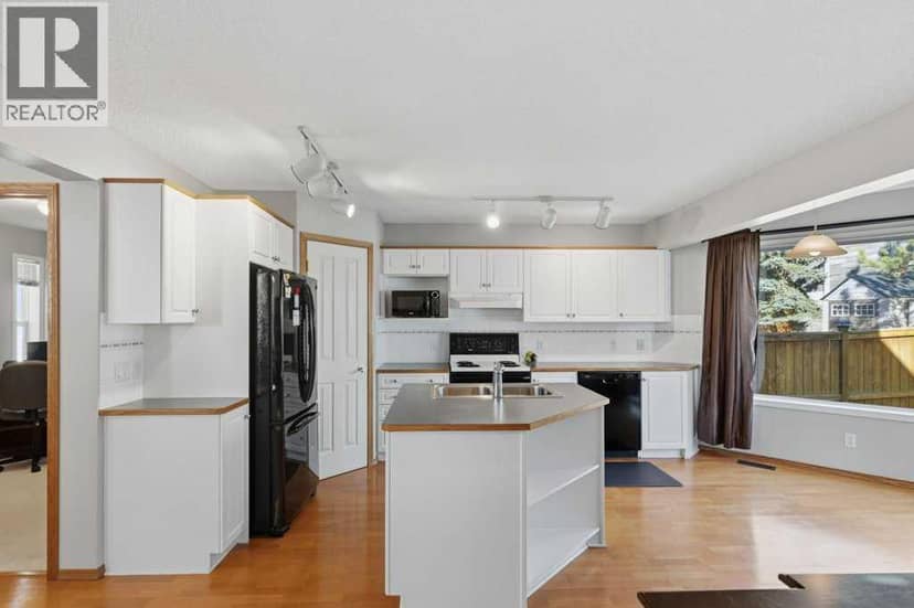 128 Douglas Ridge Close SE — photo 10 of 40