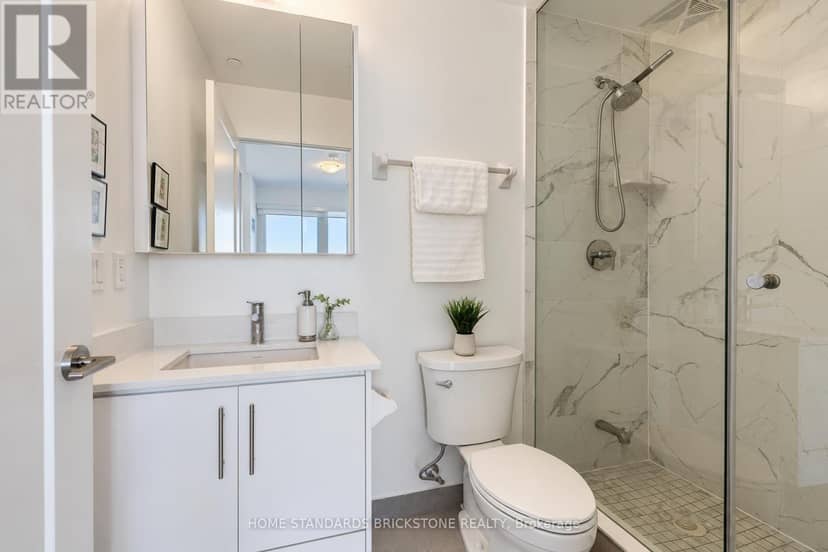 1207 - 105 Oneida Crescent — photo 18 of 40