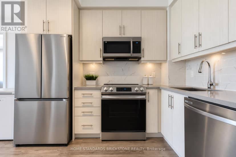 1207 - 105 Oneida Crescent — photo 10 of 40