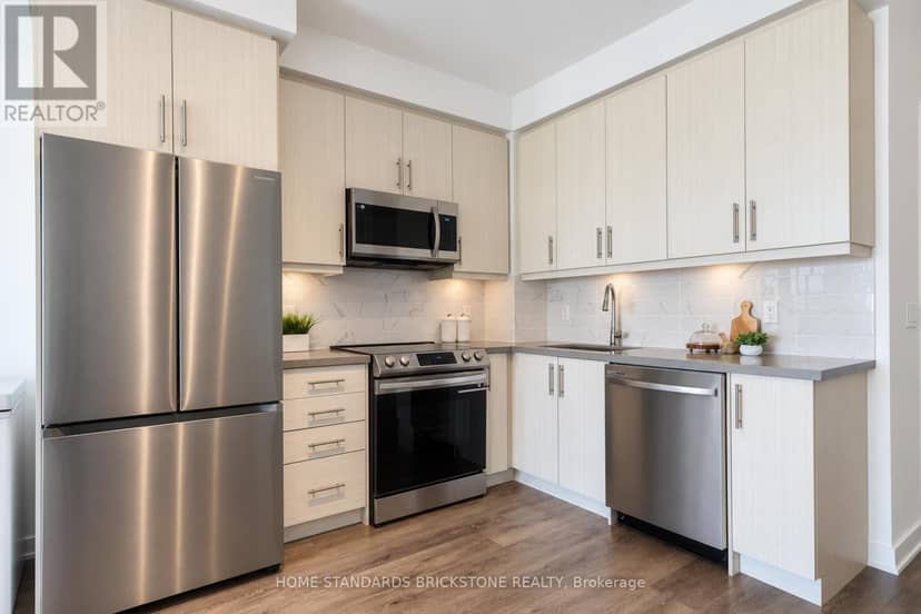 1207 - 105 Oneida Crescent — photo 9 of 40