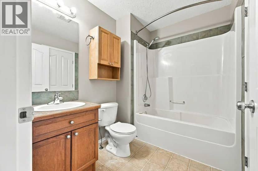 303, 2005 Luxstone Boulevard SW — photo 14 of 31