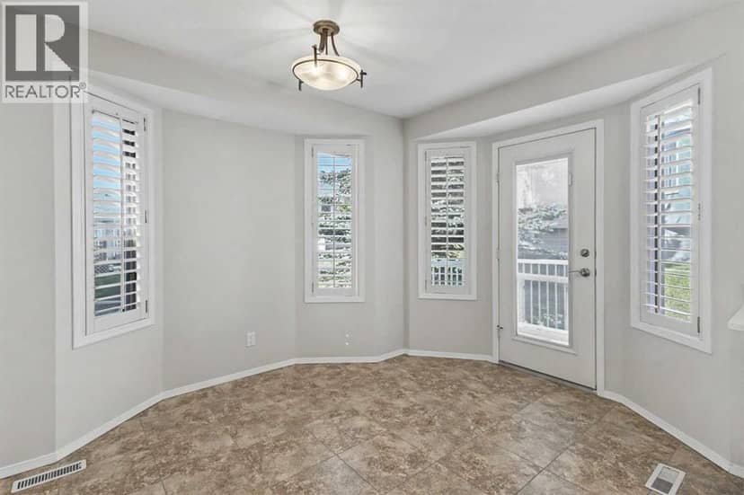 20 Arbour Cliff Close NW — photo 10 of 31