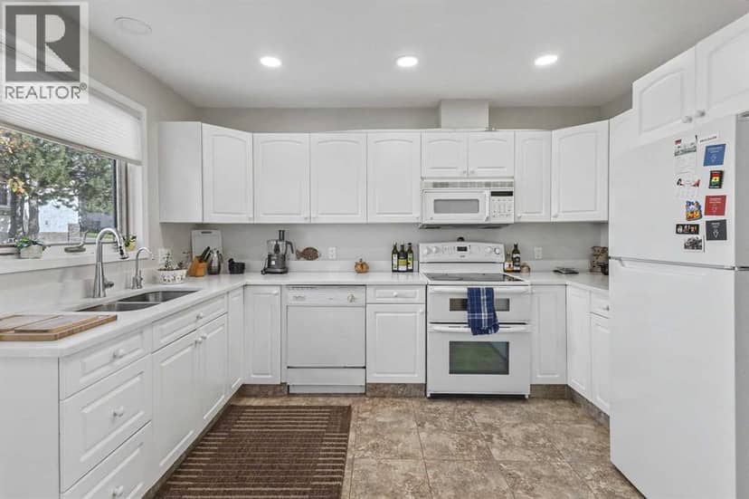 20 Arbour Cliff Close NW — photo 9 of 31