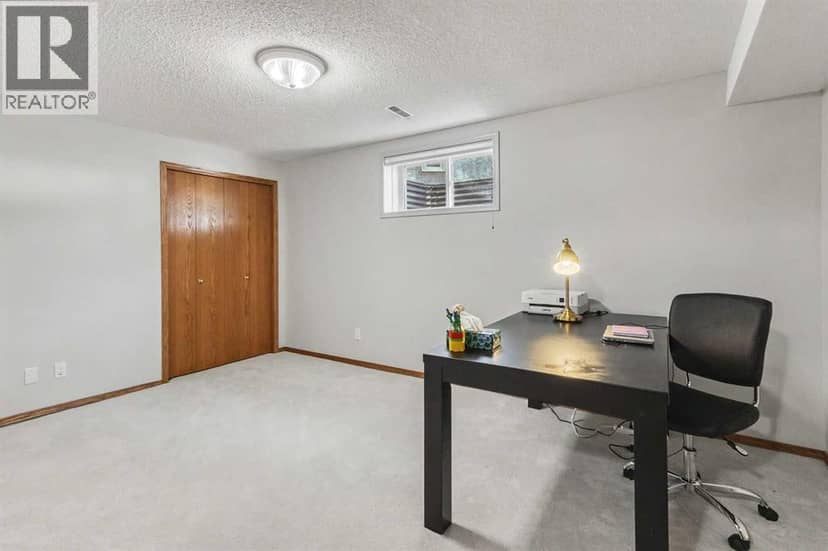 20 Arbour Cliff Close NW — photo 22 of 31