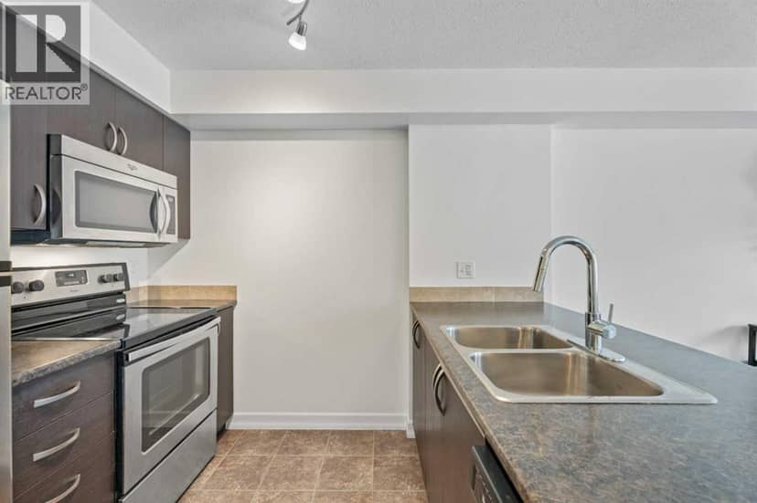 410, 121 Copperpond Common SE — photo 16 of 40