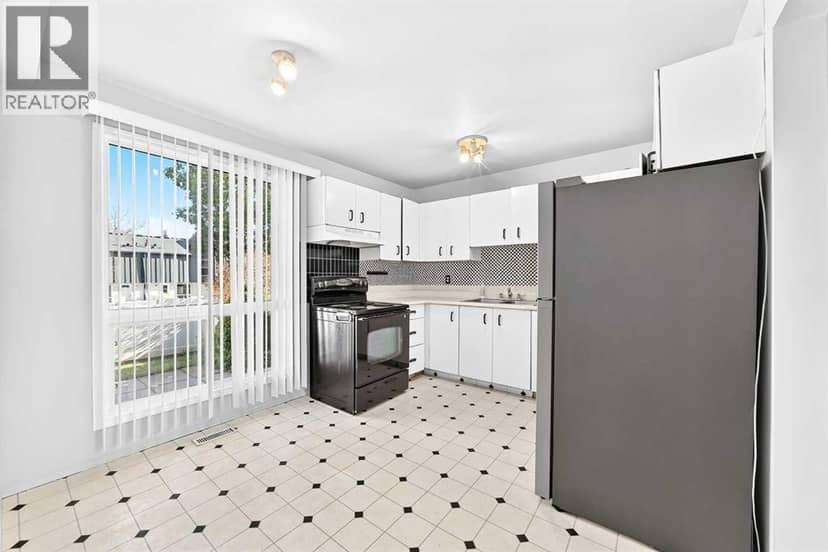 410 Brae Glen Crescent SW — photo 9 of 40