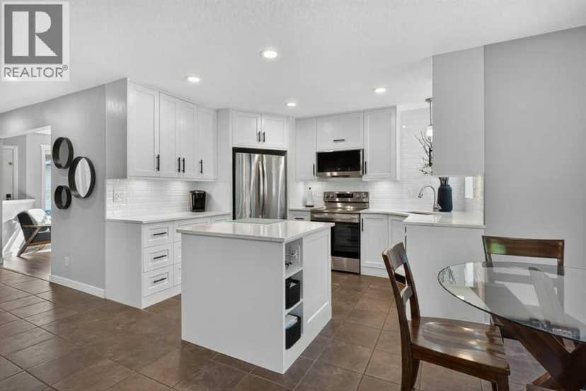 218 Harvest Creek Close NE — photo 9 of 40