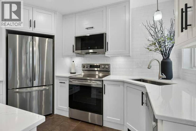 218 Harvest Creek Close NE — photo 11 of 40