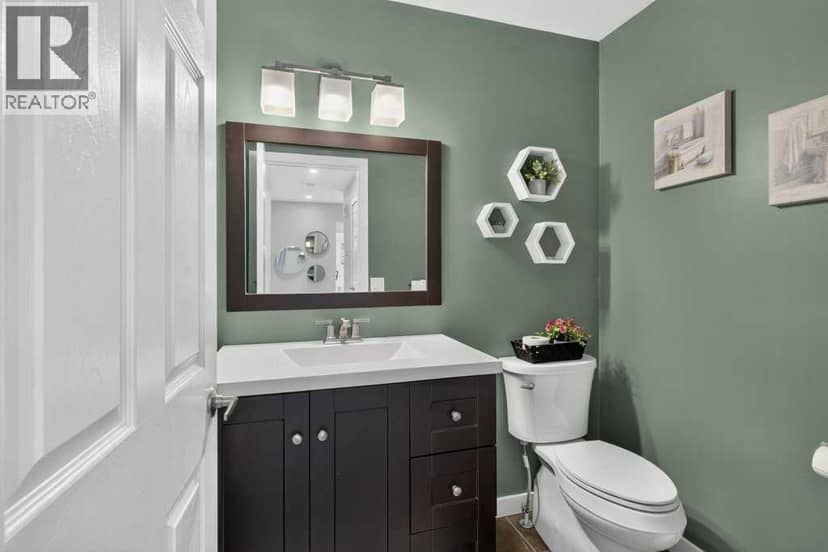 218 Harvest Creek Close NE — photo 15 of 40