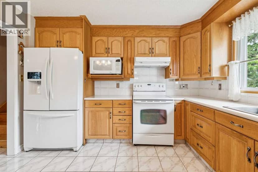 5036 Vallance Crescent NW — photo 15 of 40
