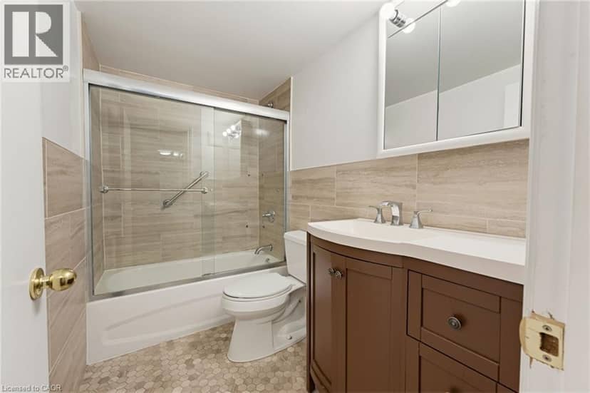 11 WOODMAN Drive S Unit# 210 — photo 12 of 24