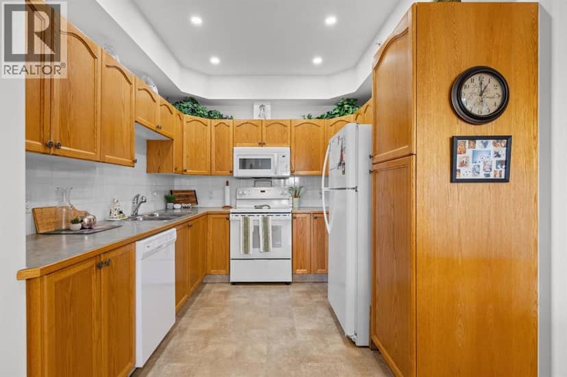 317, 728 Country Hills Road NW — photo 12 of 36