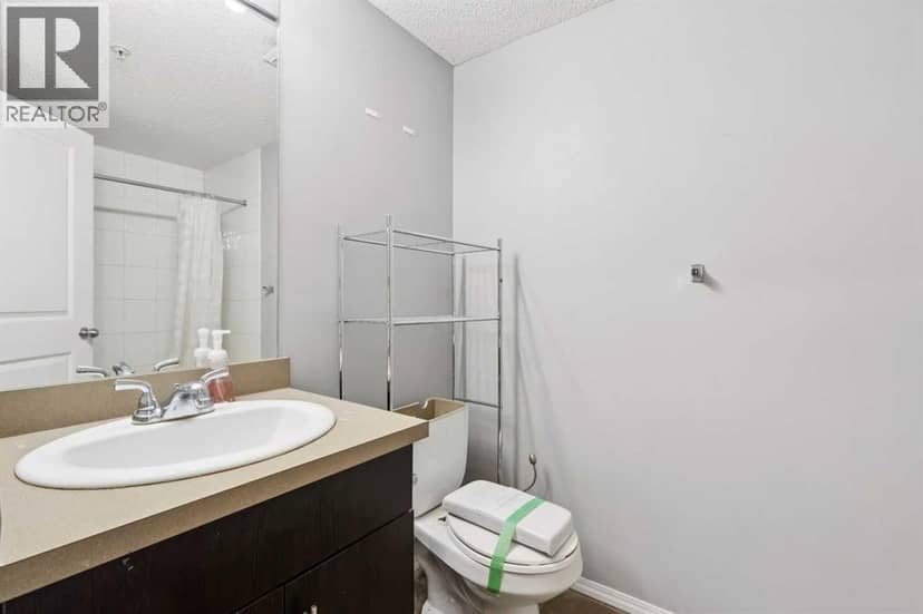 3108, 403 Mackenzie Way SW — photo 18 of 26