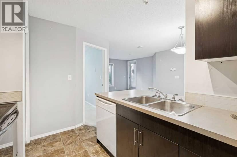3108, 403 Mackenzie Way SW — photo 12 of 26