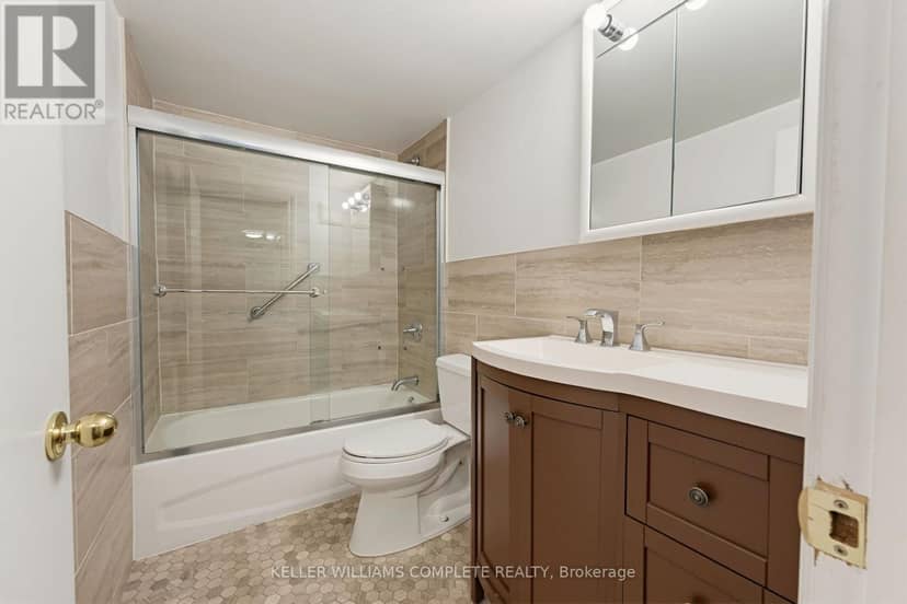 210 - 11 Woodman Drive S — photo 16 of 30