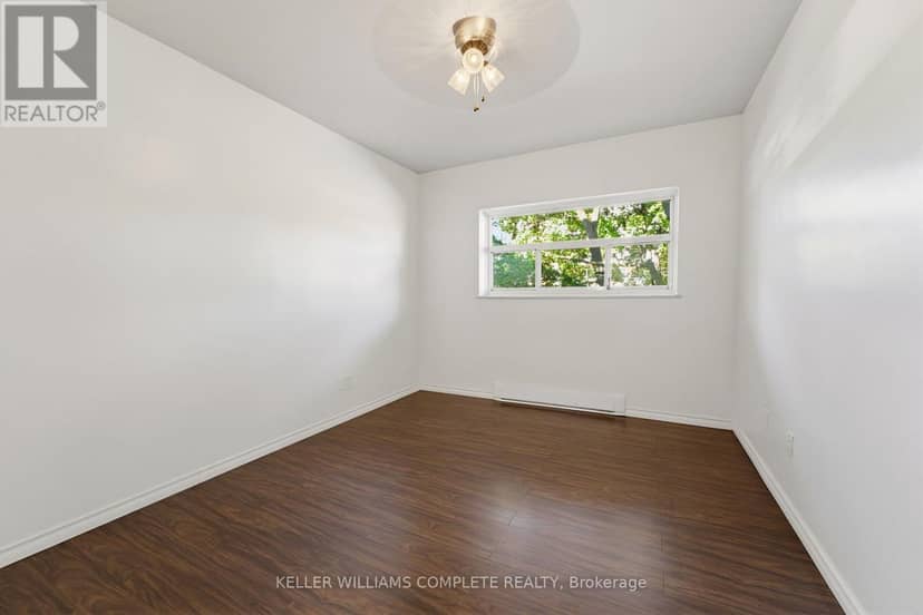 210 - 11 Woodman Drive S — photo 21 of 30