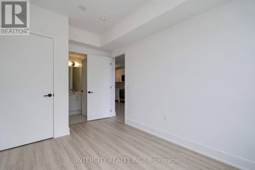 230 - 2075 King Road — photo 23 of 40