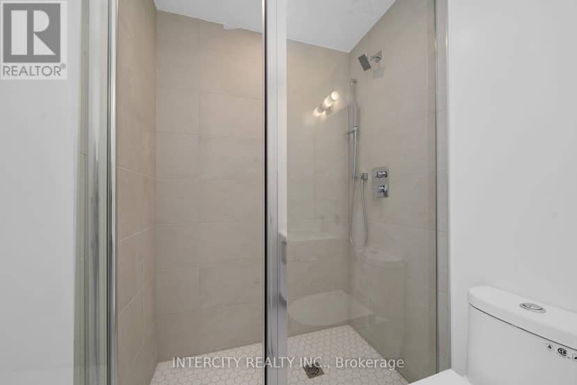 230 - 2075 King Road — photo 25 of 40