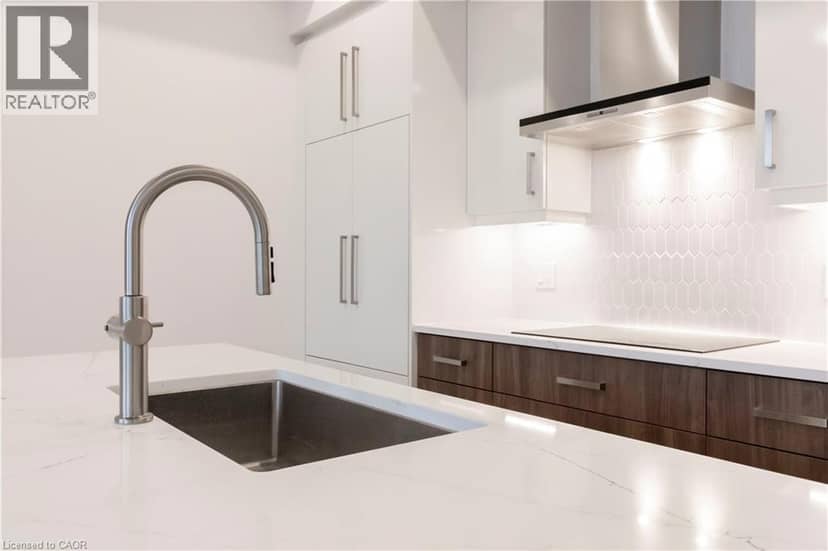15 WELLINGTON Street S Unit# 103 — photo 19 of 40
