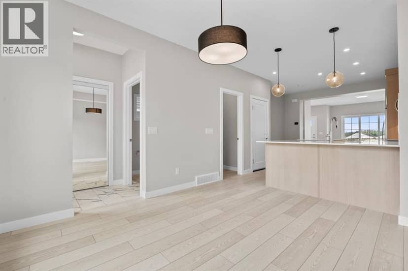 9989 Huxbury Drive NE — photo 10 of 32